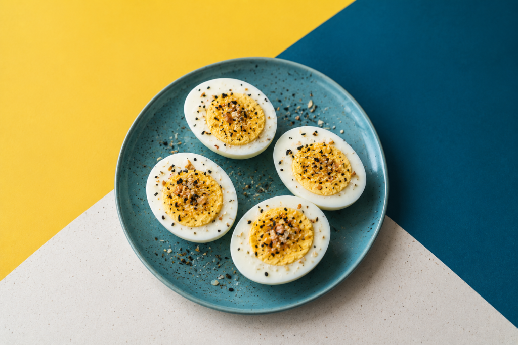 Hard boiled eggs topped with everything bagel seasoning as Healthy High Protein Snacks for quick and nutritious energy